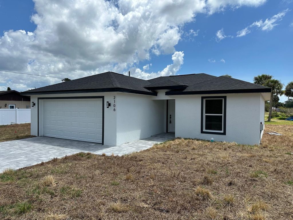 Photo of 2106 Basin St Avenue, Port Charlotte, FL 33952 (MLS # C7525950)