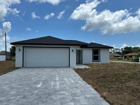 Photo of 2106 Basin St Avenue, Port Charlotte, FL 33952 (MLS # C7525950)