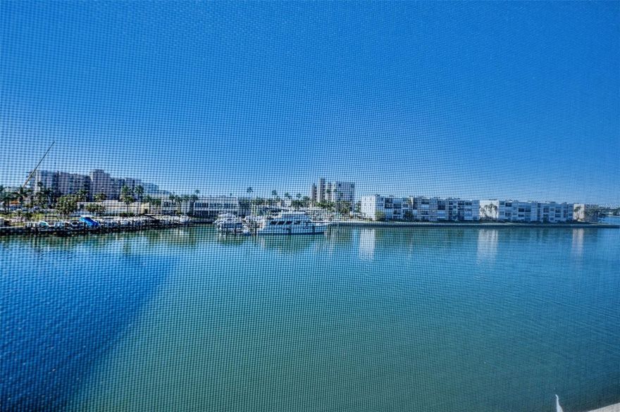 FABULOUS, WATERFRONT CONDO IN SOUTH PASADENA’S BAY ISLAND COMMUNITY WITH SPECTACULAR VIEWS! Bay Island is a well maintained, 55+ gated community surrounded by the gorgeous Boca Ciega Bay. This 3rd floor condo in the Monterey building features a popular open floor plan with open living and dining areas that provide the best peaceful waterviews. The sliding glass doors leading to the screened balcony is the perfect place to relax and enjoy watching the dolphins, manatee and exotic birds. The well-appointed kitchen offers granite, stainless steel, designer tile back splash and a breakfast pass thru bar, perfect for enjoying your guests. The Seller remodeled the condo in 2024 to add her personal touches. So many updates; newer woodlike plank vinyl flooring, crown molding, updated bathrooms, automatic shade for the sliding glass door and freshly painted. You’ll find a PRIVATE LAUNDRY WITH STACKABLE UNIT in the guest bath. HURRICANE SHUTTERS to give you peace of mind. Extra large pantry for all of your special things. The master suite is spacious and large enough for all of your furniture. It offers a walk-in closet and ensuite bath with a walk-in glass shower. There’s also a carport, elevator and plenty of guest parking. Bay Island is a sought-after waterfront destination for full-time residents or for seasonal residents. Amenities include 6 pools to choose from, a marina onsite, tennis courts, clubhouse, fitness center, library, billiard room, shuffleboard courts, many activities and more! Just minutes from St Pete Beach, wonderful restaurants and shopping. Short distance to Downtown St Petersburg and the Pier. And easy access to Airports. The community of Bay Island is so very desirable, in part because of the dazzling wealth of amenities. Enjoy waterfront leisure with community docks, ideal for boating, or relax in one of 6 pools or relax in one of 3 hot tubs. The clubhouse has a calendar full of activities, while tennis, pickleball, shuffleboard, and extensive walking paths along the waterfront cater to those wanting to get their "Steps" in. Enjoy the very short distance to to St Pete Beach, with award winning beaches, a multitude of excellent restaurants and other coastal activities. The SunRunner transit system offers easy access to the vibrancy of downtown St Petersburg with it's Pier and multiple 5- Star dining and enjoy city life. This Bay Island condo is a rare opportunity to experience the best of both worlds. Don't miss the chance to call this charming retreat your new Home. Can be sold with all furniture and house hold items. Call for your personal tour or a RealTime FaceTime Tour.