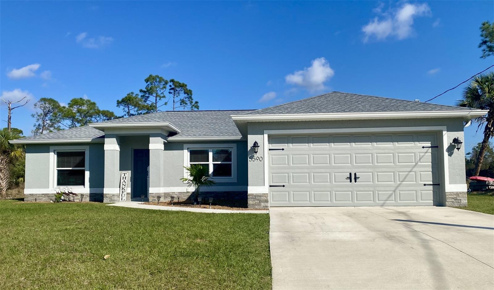 **Introducing Your Dream Home: Built for Comfort, Security, and Modern Living!** This stunning 2023 single-family home, including 1437 sq ft, is more than just a house – it's a haven meticulously crafted for effortless living. Peace of mind comes standard with hurricane-rated windows and doors, open, split floor plan with vaulted ceilings, and no flood insurance in Zone X,
Step inside and discover a wealth of upgrades, from the convenient camera doorbell and electronic door lock to the thoughtful window treatments. Efficiently insulated garage, complete with MyQ door opener. Enjoy the ease of the washer and dryer, stylish kitchen window treatments, and pristine landscaping with the irrigation system and improved paver trash area.
Stay connected with internet readiness and relax in the screened lanai, added shade blinds for your comfort. This home is brimming with extras!
Appreciate the upgraded shower heads, Stainless steel appliances, and high-quality ceiling fans and lighting. The charming brick treatment on the front of the house, along with upgraded landscaping, enhances the curb appeal. A high-efficiency HVAC system with a heat pump and programmable digital thermostat ensures year-round comfort, while the water softener and filter system provides clean, refreshing water. The garage attic insulation adds to the home's energy efficiency as well. Located in a quiet, remote neighborhood with few neighbors, you'll find tranquility and privacy. And with so much more not mentioned, all for just $332,000, this is an opportunity you won't want to miss! Schedule your viewing today!