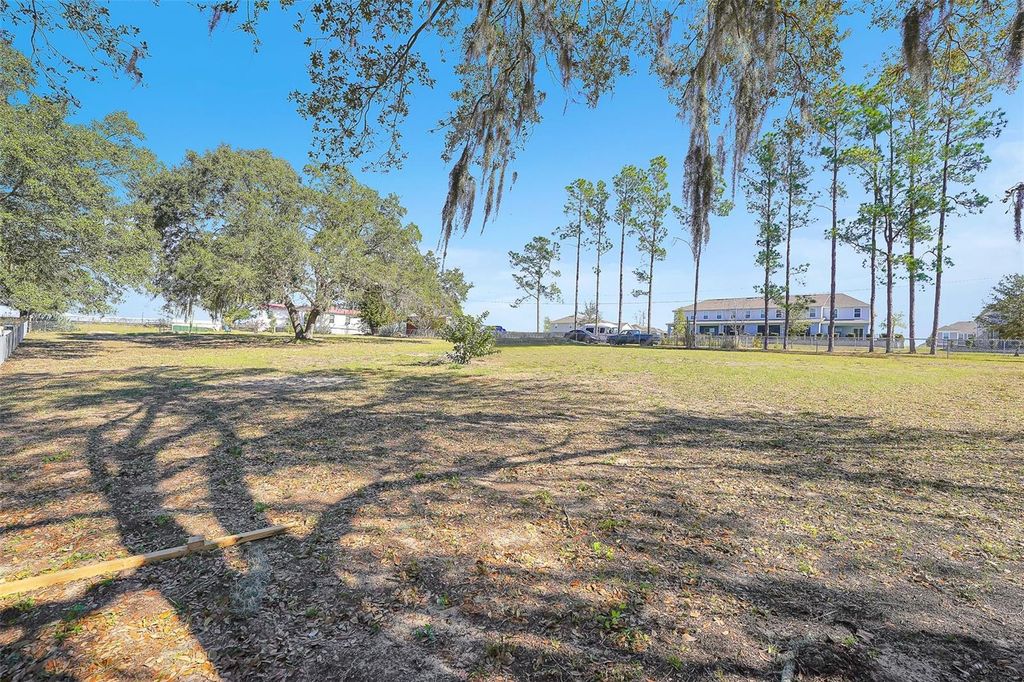 Photo of 0 Holly Hill Grove 2 Road, Davenport, FL 33837 (MLS # TB8466735)