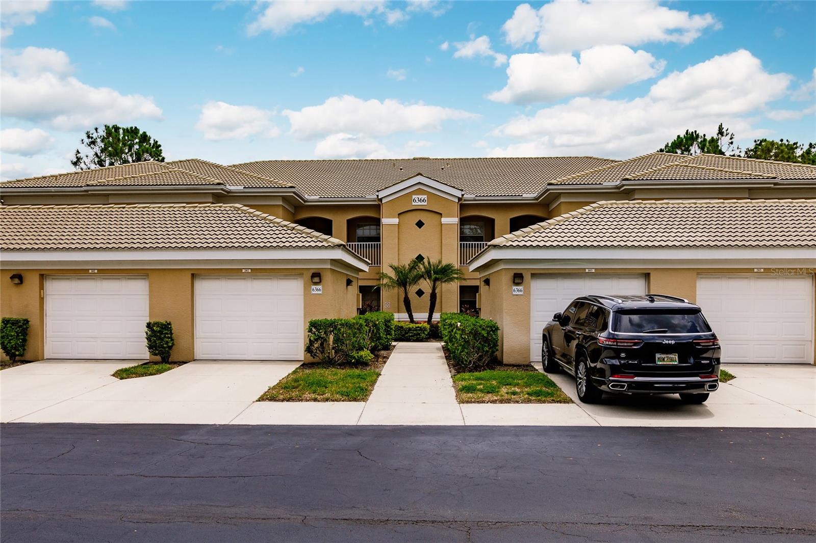 Look what's making a stylish comeback! As the current tenants prepare to move out, seize this opportunity to be the first to witness the refreshed potential of this property! The three-bedroom corner-end unit at Tara Preserve Grand Oak is a true gem! Offering 1,659 sq ft of living space, it showcases stunning golf course views, all without the need for a golf membership. Upon entry, find a thoughtfully designed interior featuring crown molding, an expansive living room, an island kitchen, ceiling fans, newer A/C (2022), and a mix of tile, laminate, and carpet flooring. Retreat to the tranquil primary bedroom with an en-suite bathroom and ample closets. Two additional bedrooms offer versatility, providing room for a home office, gym, hobby room, or guest accommodations. Embrace the seamless indoor and outdoor living blend with a sizeable lanai area perfect for entertaining guests or unwinding in the refreshing breeze. Tara Preserve features lush landscaping, one of Florida's finest 18-hole championship golf courses, tennis and pickleball courts, a heated pool, and a recreational facility. The community is conveniently located on major highways, shopping, restaurants, and highly sought-after Gulf Coast beaches. Affordable fees include water, sewer, pest control, cable TV, internet, ground maintenance, pool maintenance, recreational facilities, and insurance. Grab this lucrative condo investment now!