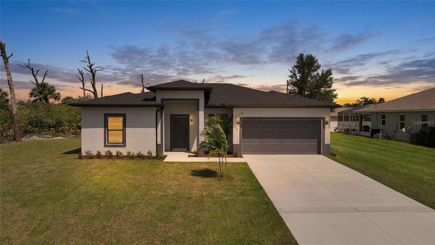 Brand new MOVE IN READY home outfitted with elegant and high quality materials. This is a spacious 4/2/2. Upon entering the home you'll be greeted with a large open space with tons of natural light coming through the IMPACT WINDOWS AND SLIDERS. The home is outfitted with a beautiful porcelain tile throughout the entire home. The kitchen features a large quartz island, soft close cabinetry, lots of counter space, stainless steel appliances and a charming stone tile back-splash. The home has a private split bedroom layout boasting large bedrooms. The primary bedroom boasts a large walk-in closet and an on-suite bathroom with a double vanity sink and a large walk-in shower with a beautiful marble look. The light and bright style of home is the perfect canvas for you to decorate any-way you see fit. NO FLOOD ZONE, NO HOA AND NO DEED RESTRICTIONS. This location is super close to Englewood Beach, Manasota Key Beach, and Boca Grande beach as well as the Historic Dearborn Street where you'll find amazing restaurants, farmers markets and more. Spring Training Baseball is right up the road at Charlotte Sports Park and Cool Today Park. Close proximity to Grocery shopping, hardware stores, medical offices and Englewood Hospital. Be sure to view the 3D VIRTUAL TOUR. Florida is calling your name!