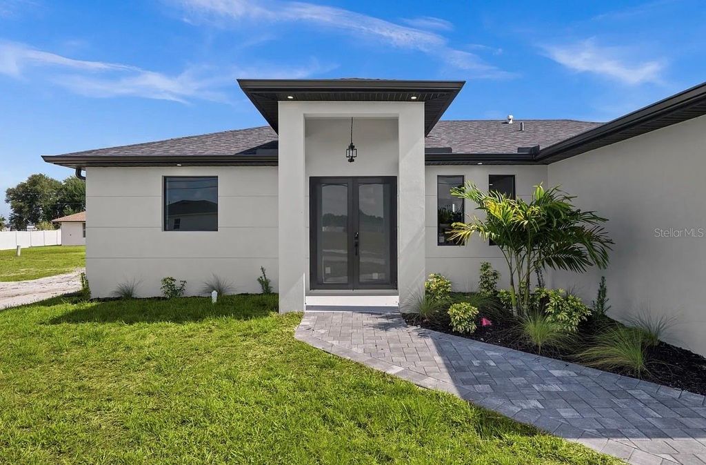 Photo of 1805 NW 12th Street, Cape Coral, FL 33993 (MLS # TB8512508)