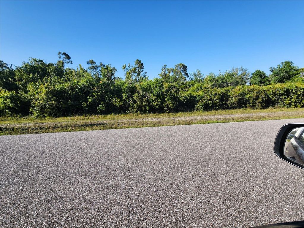 Photo of 12206 Duval Boulevard, Port Charlotte, FL 33981 (MLS # D6135834)