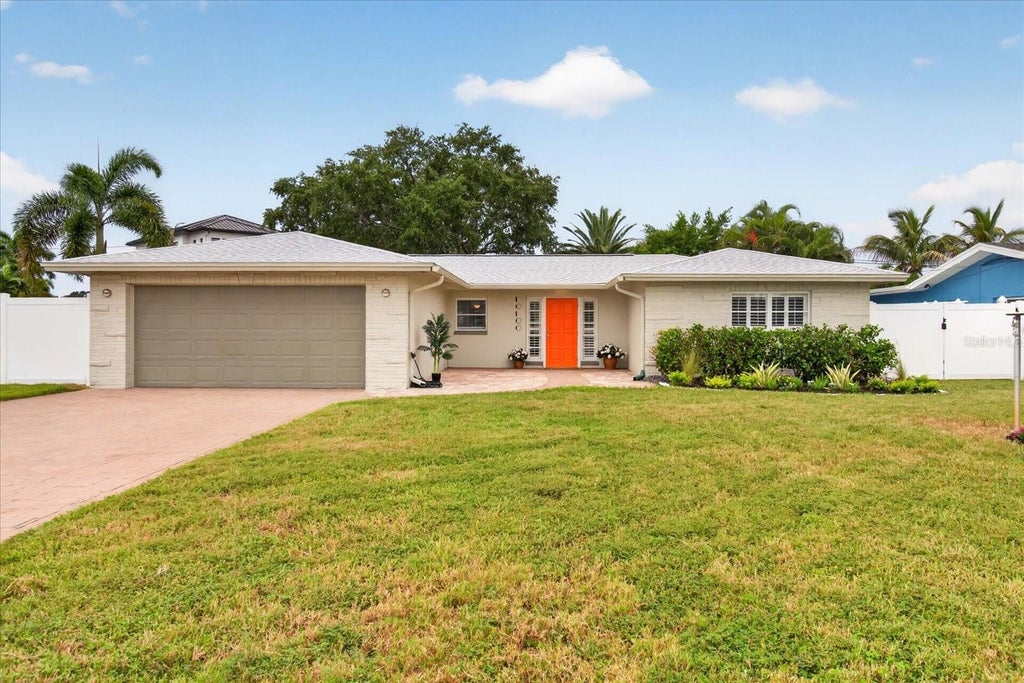Photo of 10100 Paradise Boulevard, Treasure Island, FL 33706 (MLS # TB8555177)