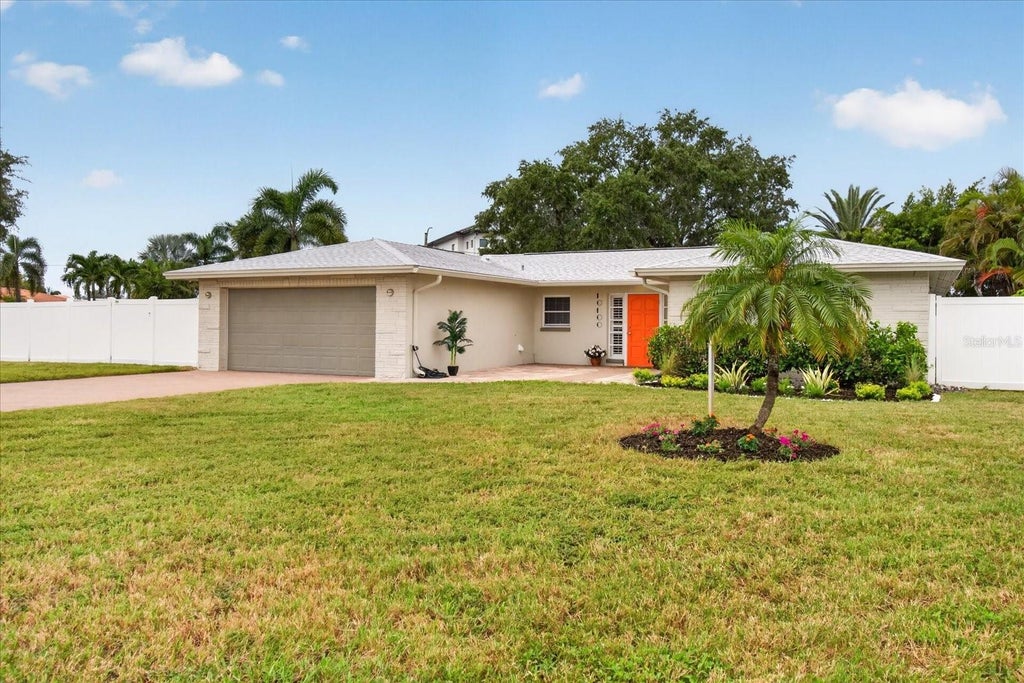 Photo of 10100 Paradise Boulevard, Treasure Island, FL 33706 (MLS # TB8555177)