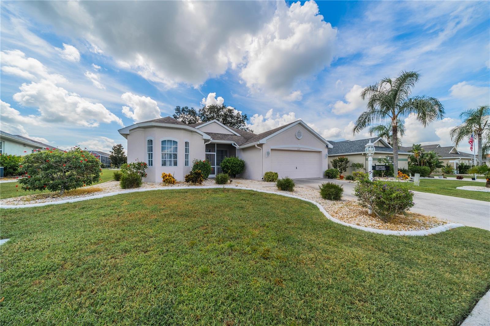 This exquisite home shows like a model. All tile floors. Entering the leaded glass door, you are greeted by a spacious Great Room and Dining Room, light & bright w/high ceilings. This flows to the enclosed Florida Room where you can relax with a book or have your morning coffee & watch the sun rise. The kitchen is a cook's dream w/upgraded cabinets, stainless appliances, spacious granite counters and an island. The breakfast nook is large enough to accommodate a table & chairs for a quick bite or dinner. The Master Bedroom Suite, fit for a King or Queen enjoys a large walk-in closet, granite counter with dual sinks, walk in shower and a soaking tub. The 2nd bedroom & bath are situated for privacy for your guests. The den/office with leaded glass doors has a wall of built-in cabinets & plenty of counter space. There's an inside laundry room w/washer & dryer and the large screened lanai offers lots of privacy. The 2-car garage has a lot of built-in storage. The roof and AC were replaced in 2020. This golf cart community, with lots of amenities also offers Supermarkets, Pharmacies, Home improvement & discount stores. There are Medical facilities, including a Hospital & Doctors' offices, Financial institutions & Various Houses of Worship. Located midway between Tampa & Sarasota, Sun City Center is within easy reach to major Shopping Centers, Performing Art Centers, Major League Sporting events, World Class Beaches, 3 major Airports & the "Magic" of Orlando & other tourist attractions. Don't miss out on the opportunity to own this beautiful home.