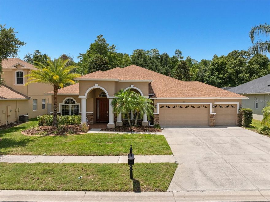 One or more photo(s) has been virtually staged. Nestled within the prestigious, gated community of Stonegate in Land O' Lakes, this stunning executive home offers the perfect blend of elegance, comfort, and functionality — with no CDD fees.
From the moment you step inside, soaring high ceilings and a bright, open split floorplan set the tone. Decorative art niches, abundant closet space, and thoughtful design details elevate every corner of this 4-bedroom, 3.5-bath, 3-car garage masterpiece.
The heart of the home is a spacious eat-in kitchen featuring a quartz-topped island, flowing seamlessly into the formal living and dining rooms and an expansive family room. Triple sliding pocket doors open to an impressive 800 sq ft screened lanai — your private outdoor retreat complete with a built-in kitchen and freestanding hot tub, all backing up to a serene conservation lot with no rear neighbors.
The owner's suite is a true sanctuary: an 8-foot double door entry, tray ceiling, dual pocket doors to the lanai, soaking tub, walk-in shower, and dual vanities. A private guest suite with its own ensuite bath doubles beautifully as a home office. Upstairs, a generous bonus room with half bath is ready for a home theater, playroom, or fifth bedroom.
Peace of mind is built in — new roof (2017), new A/C (2023), new water softener (2023), new water heater (2024), new LG washer & dryer (2023), upgraded carpet with premium padding, and new ceiling fans throughout.
The Stonegate community delivers resort-style amenities including a clubhouse, pool, fitness center, fishing pier, and playground. Zoned for top-rated Pasco County schools, and just minutes from I-75, the Suncoast Expressway, Tampa International Airport, Wiregrass Mall, Premium Outlets, Costco, and more.
This home is move-in ready and priced to sell — schedule your private showing today.