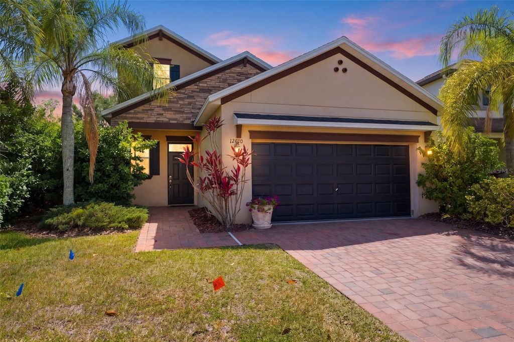 Photo of 12010 Lake Boulevard, New Port Richey, FL 34655 (MLS # W7885566)