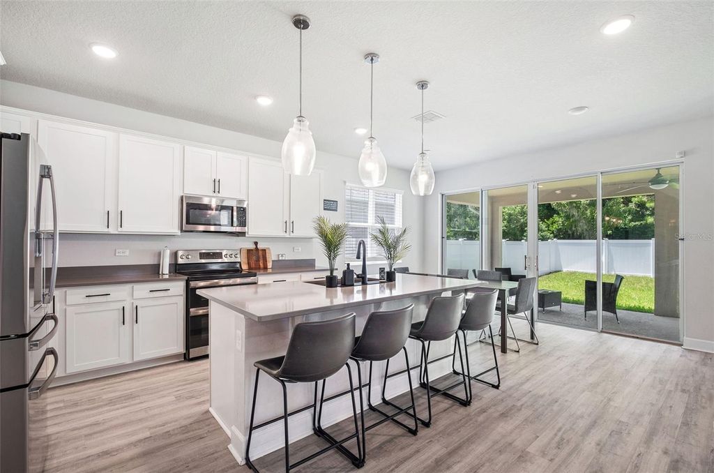 Photo of 1130 River Falls Circle, Deland, FL 32720 (MLS # O6393009)