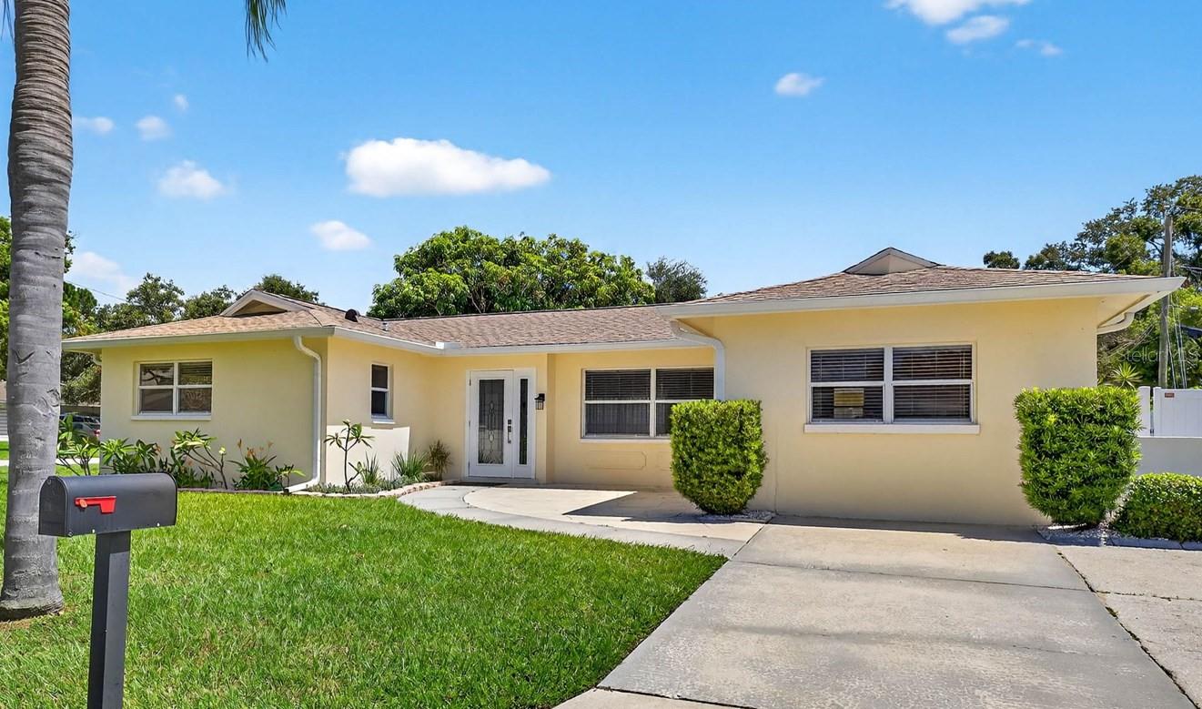 One or more photo(s) has been virtually staged. Welcome home to this updated 3 bedroom, 2 bath property in the heart of Pinellas County! Situated on a desirable spacious corner lot with only two neighbors, this home is in a well-kept neighborhood with no HOA, no CDD fees, and no flood insurance required.
Inside, you’ll find a bright and functional split floor plan that offers privacy and space. The main bedroom includes a remodeled en-suite bathroom and private entry (ideal for use as a guest suite, short-term rental, or multi-generational setup). A spacious bonus/family room with a new mini-split system (2025) provides extra flexibility for a home office, playroom, or second living area.
Recent upgrades include a new hot water heater (2025), luxury vinyl plank flooring, fresh interior and exterior paint, new stainless steel kitchen appliances, and a vinyl privacy fence (2024). The roof was replaced in 2021, and the home also includes all window treatments and a transferable termite bond.
Enjoy the nearby community park just a short walk away, offering tennis and pickleball courts, a dog park, splash pad, biking trail, and an outdoor fitness area. This home is conveniently located less than 15 minutes to the Gulf beaches, 12 minutes to downtown St. Pete, and just 25 minutes to Tampa and the Tampa International Airport. Move-in ready and well cared for, this home is a great opportunity in a central location.