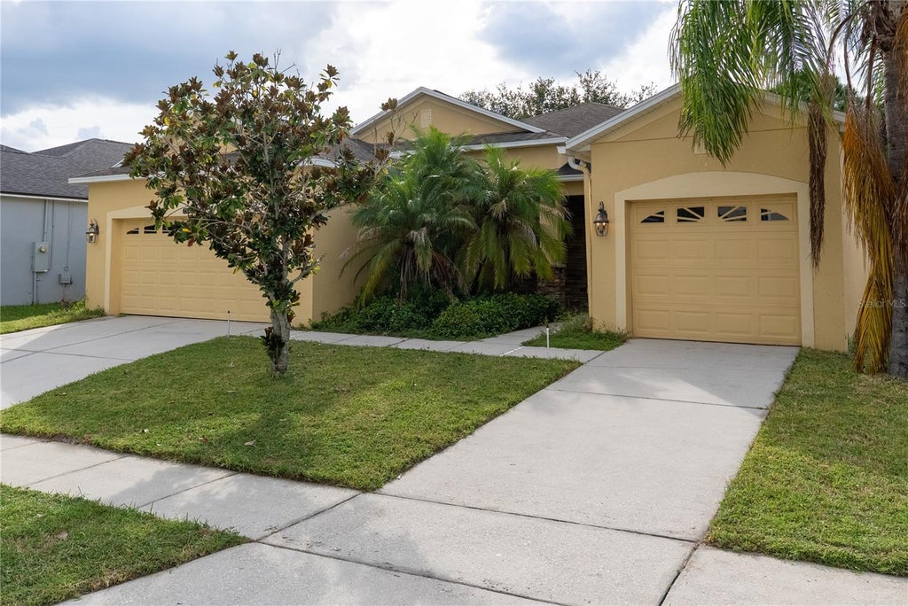 Photo of 2336 Crosston Circle, Orlando, FL 32824 (MLS # O6441794)