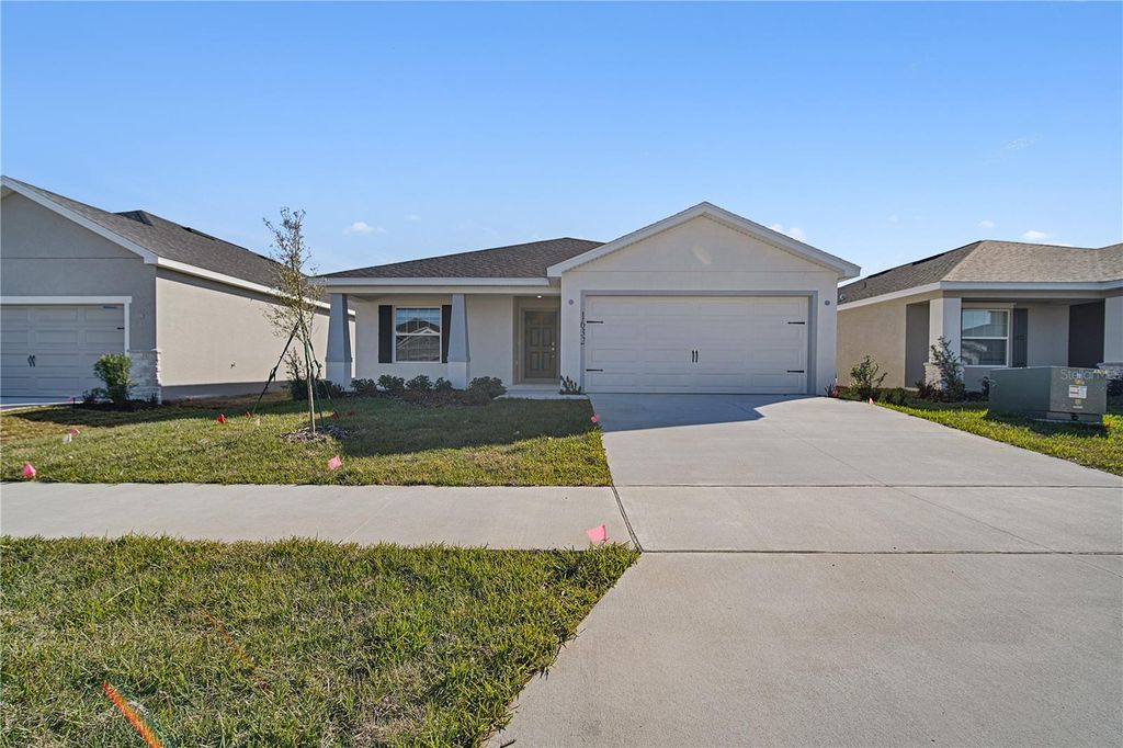 Photo of 1632 Astrid Rd, Davenport, FL 33837 (MLS # S5143215)