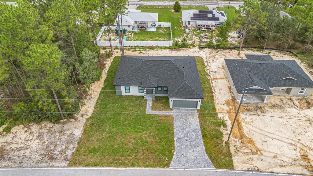 Photo of 9230 N Citrus Springs Boulevard, Citrus Springs, FL 34433 (MLS # O6368498)