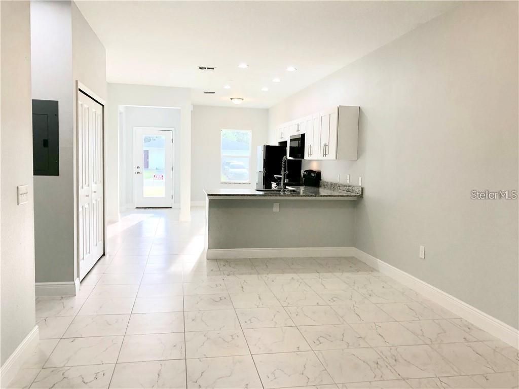 Photo of 717 Camel Court #A, Kissimmee, FL 34759 (MLS # S5144702)