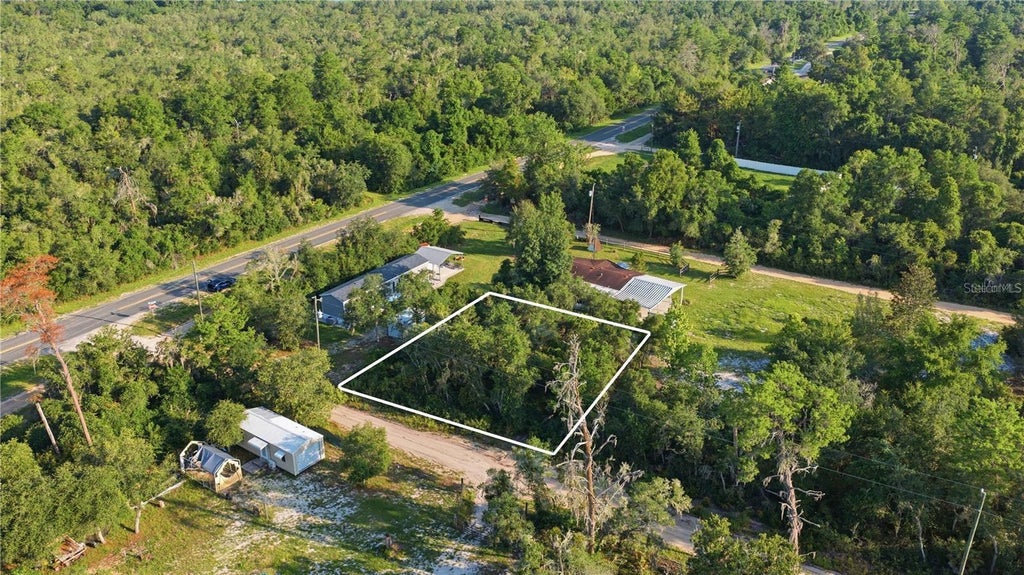 Photo of Tbd NE 235th Street, Fort Mccoy, FL 32134 (MLS # OM729339)