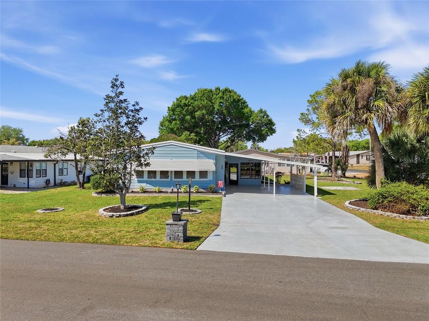 Welcome to 401 Tivoli Park Drive, ideally positioned on an oversized corner lot directly across from the main clubhouse in the desirable Polo Park East 55+ golf community. This well-maintained 2-bedroom, 2-bath manufactured home offers an open and functional layout designed for comfortable everyday living.
The front living area has been refreshed with brand new carpet and fresh paint, creating a bright and inviting space as you enter. The open floor plan flows seamlessly into the dining and kitchen areas, making it perfect for both relaxing and entertaining. Both bedrooms are generously sized, and the home offers ample storage throughout.
Enjoy the convenience of being just steps from the community’s main amenities, including the clubhouse, pool, tennis courts, and golf course. Polo Park East is known for its active lifestyle, well-kept grounds, and prime location near shopping, dining, and major roadways.
Whether you're looking for a full-time residence or a seasonal retreat, this property offers an excellent opportunity to enjoy low-maintenance living in one of the area’s most sought-after 55+ communities.