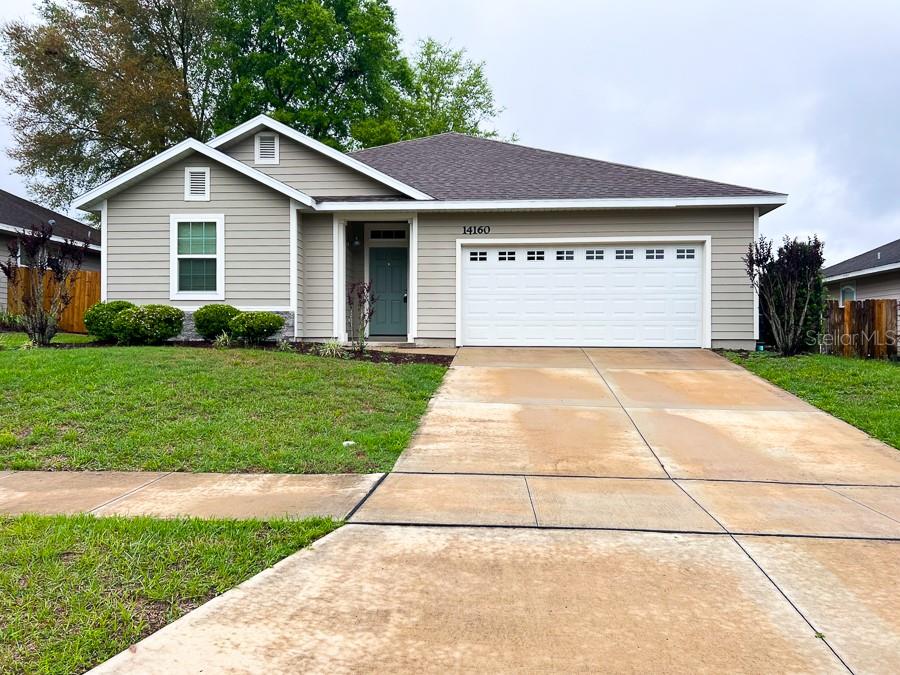 Location! Location! Move-in ready, 3-bedroom, 2-bath, 2018-build in Strawberry Fields. This home boasts over 1,400 square feet and features: a split floor plan, tray ceilings, crown molding, vinyl plank flooring (carpets in BRs), and a gas tankless hot water heater. Step through the front doors and make your way to the open living space featuring a family room, dining room, & kitchen with granite countertops, stainless steel appliances, gas stove/range, soft-close cabinets, and utility room with laundry (SS washer/dryer included) & walk-in pantry. The owner's suite is sure to impress with a walk-in closet & bathroom featuring a double vanity, walk-in shower with multi-shower heads, & luxurious tile selections! There are two additional bedrooms and luxury bath off the entrance. Enjoy the fully fenced in backyard with covered patio & two car garage! Minutes to Publix, restaurants, shopping, and Town of Tioga. Utilities provided by Clay Electric & gas through GRU. Lawn Care is included in the rent! Schedule a showing today!
*Renter’s insurance is required!
$60.00 Application Fee (Per Person Over the Age of 18)
$60.00 Guarantor Fee (if Applicable)
$250.00 Administrative Leasing Fee (Due at Time of Lease Signing)
Security Deposit is equivalent to one month's rent!
