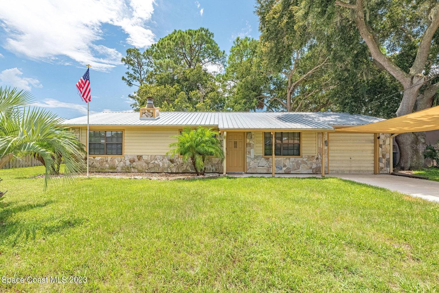 This pristine home boasts a metal roof as of October 2020, giving you peace of mind for years to come. The backyard is a true oasis, filled with great trees & ample shade and fully fenced for privacy. Transferable termite bond, ensuring that your investment is protected. Inside the house, you'll find an open floor plan that is perfect for entertaining. Family room features a wood-burning fireplace & exposed beams, which add a touch of rustic charm to the space. Kitchen overlooks the backyard, so you can cook while keeping an eye on your kids or pets. If you love spending time outdoors, you'll appreciate the custom fire pit area which is perfect for chilly nights. AC 1 YO ensuring that you'll stay cool & comfortable during summer months. Extras: Laundry room, storage and so much more!