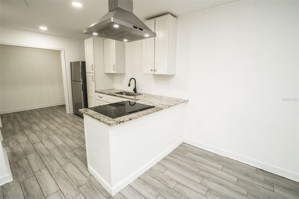 Photo of 1007 E 32nd Avenue #1/2, Tampa, FL 33603 (MLS # TB8498172)