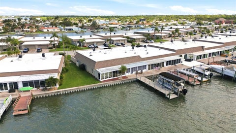 Photo of 594 Boca Ciega Point Boulevard N, St Petersburg, FL 33708 (MLS # TB8520849)