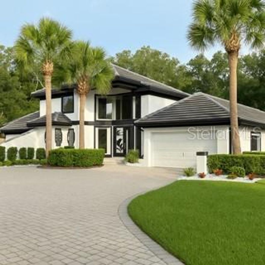One or more photo(s) has been virtually staged. NEW PRICE! Experience refined living in Regency Green at Heathrow, one of Central Florida’s most prestigious 24 hour-guard gated golf communities, with this distinguished 3-bedroom, 2.5-bath residence featuring an upstairs bonus room, soaring ceilings, and a smart split floor plan. The elegant primary suite boasts a cozy fireplace, private lanai access, and a spa-inspired bath with dual vanities, soaking tub, walk-in shower, and expansive closet, while the chef’s kitchen with crisp white cabinetry flows seamlessly into the inviting family room with fireplace and a sophisticated bar area off the foyer. Recent updates include new Hybrid Resilient flooring ($13K), fresh interior and exterior paint ($20K), a brand-new tile roof ($85K), upgraded landscaping, new skylights, pool equipment, and recessed lighting. Outdoors, a screened lanai frames the sparkling pool and fenced yard with brick and wrought iron details, offering both charm and privacy. With three fireplaces, timeless style, and an enviable location near Heathrow Country Club, fine dining, best schools, and upscale shopping, this home presents a rare opportunity in one of the area’s most coveted enclaves.