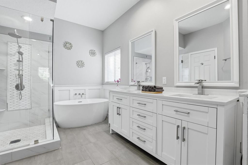 Photo of 4617 Whispering Park Lane, Tampa, FL 33614 (MLS # TB8476021)