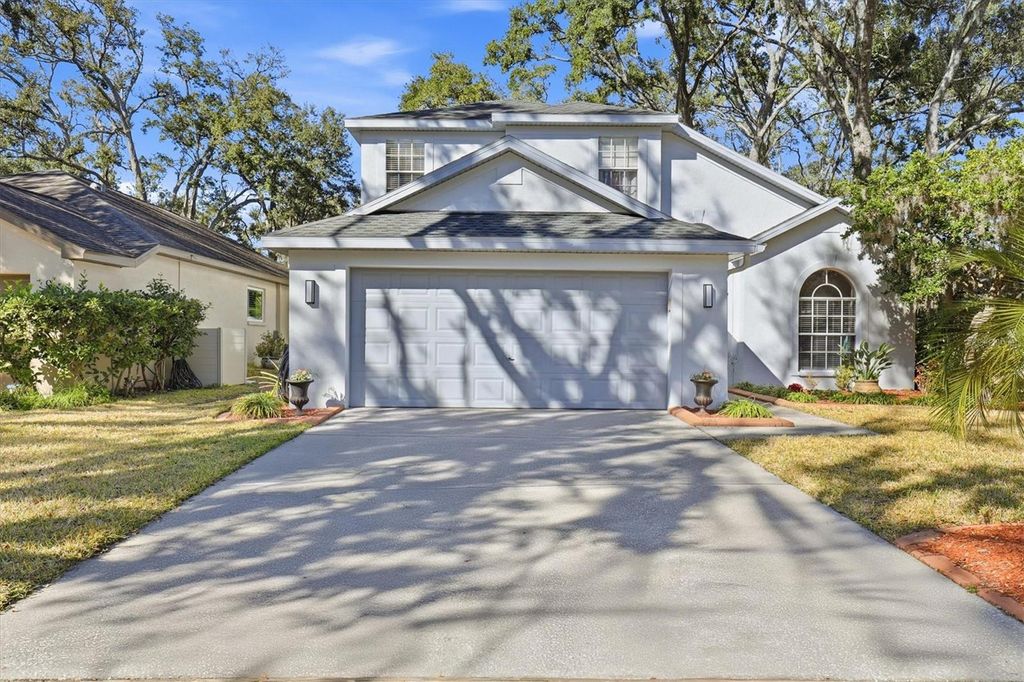 Photo of 4617 Whispering Park Lane, Tampa, FL 33614 (MLS # TB8476021)