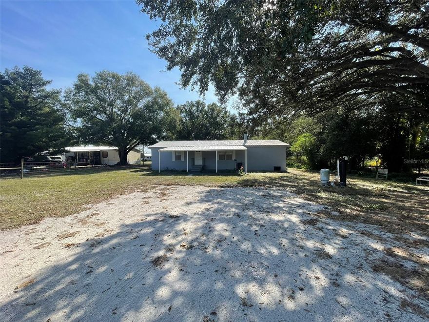Charming Fully Updated 3BR/2BA Manufactured Home on 0.25 Acres — NO HOA + NO Restrictions! ZERO-DOWN FINANCING AVAILABLE! Enjoy peaceful country living with fantastic neighbors and access to excellent schools in this beautifully refreshed 3/2 manufactured home situated on a spacious ¼-acre lot. NO deed restrictions, NO age restrictions, and NO pet restrictions — bring your boats, RVs, work trailers, and extra vehicles! The property is mostly fenced and offers abundant parking.                                                                                                        This home also qualifies for a ZERO-DOWN financing program for owner-occupants, making it an incredible opportunity for affordable homeownership. Step inside to discover all-new everything, including updated finishes and a cozy wood-burning fireplace as the focal point of the living area. The desirable split-bedroom layout ensures comfort and privacy, while the primary suite impresses with an oversized walk-in AND walk-through closet—far larger than you’d expect. Relax or entertain on the expansive covered front patio, perfect for enjoying the peaceful country setting. With NO HOA and a move-in-ready interior, this home truly offers country living at its finest. Note: The lot is in the process of being subdivided into its own parcel. Lot 4B (located behind the home) does NOT convey with this sale. Listing shows it as .25 acres however as soon as the survey is complete with the new lot cut off it will be provided to the Buyer/s. Don’t miss out—opportunities like this are rare!