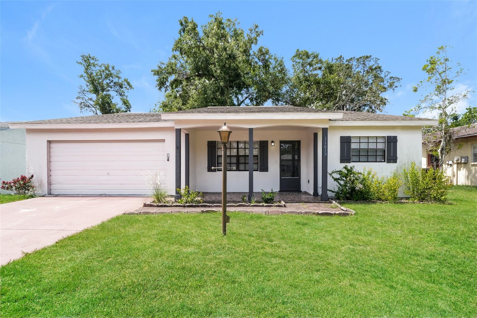 Charm and curb appeal abound for this Port Richey home! Step inside into the inviting foyer, through the dining room, and into the well-appointed living room, positioned at the center at the home. The kitchen boasts stainless steel appliances, hard surface countertops, and ample storage. Rounding out this ranch style floorplan is the primary bedroom and two secondary bedrooms. Come and see for yourself the possibilities that this home has to offer!