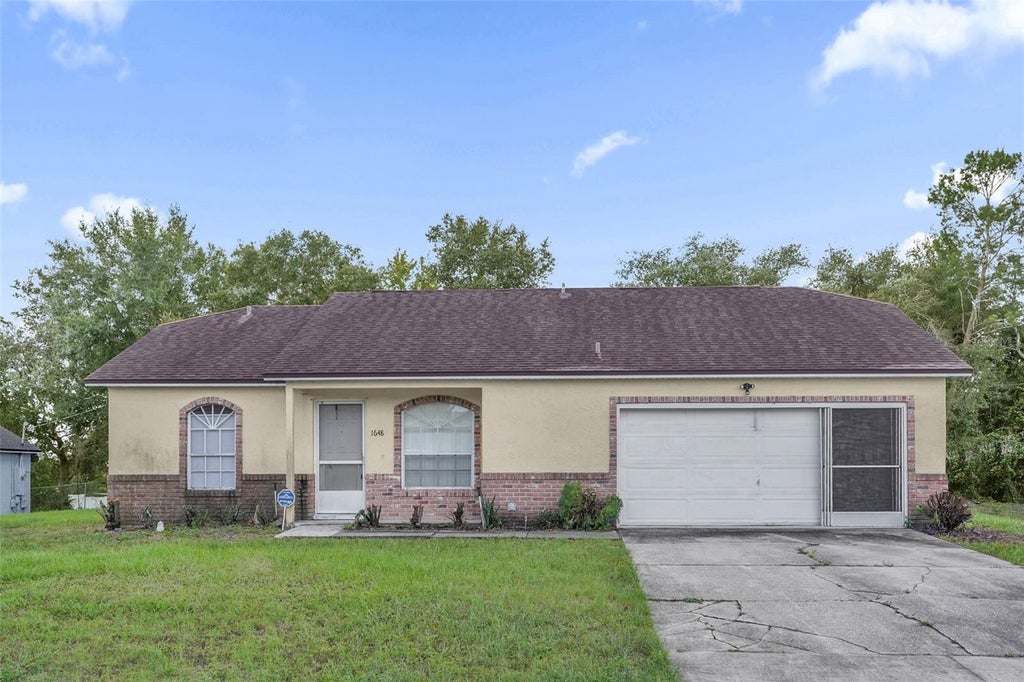 Photo of 1648 Dunlap Drive, Deltona, FL 32725 (MLS # O6452899)