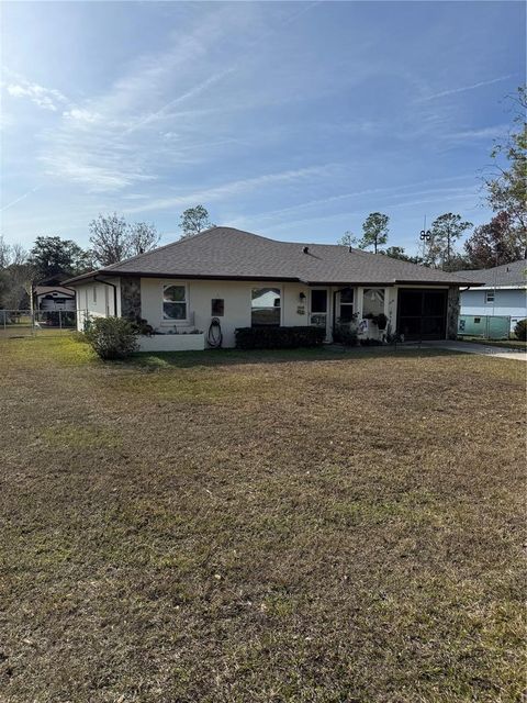 Photo of 21176 SW Plantation Street, Dunnellon, FL 34431 (MLS # OM716409)