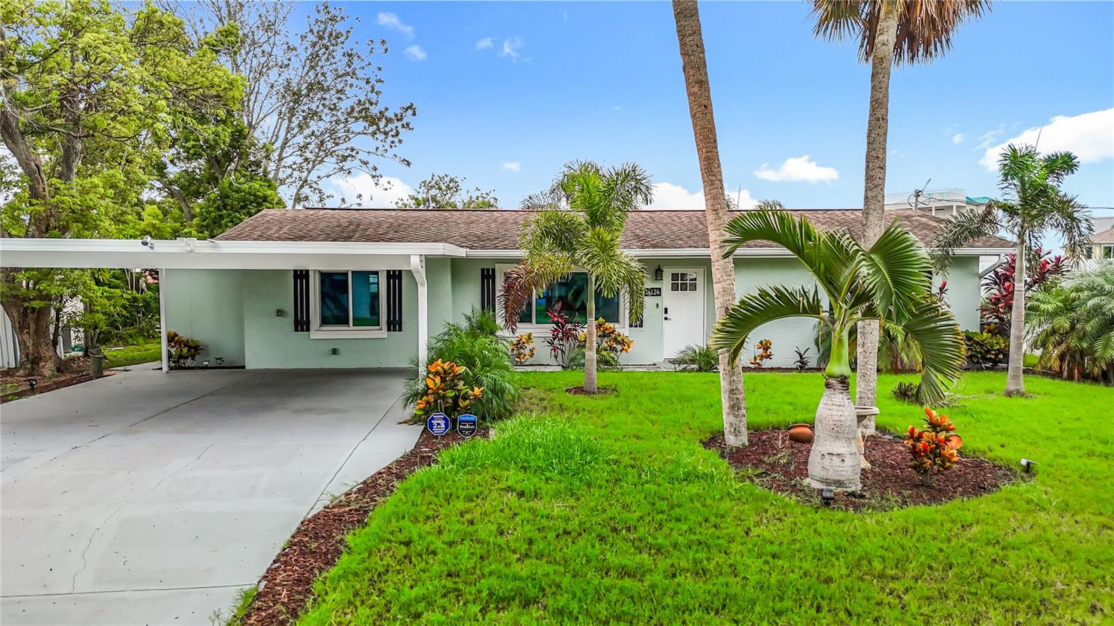 MOTIVATED SELLER – Relocation opportunity creates your gain! 4-point & wind mitigation available.
Welcome to 14124 Kulig Ct, a stunning waterfront home featuring authentic Key West-style finishes and deep canal access with direct routes to the Gulf of Mexico. This meticulously renovated property offers true resort-style living year-round, where you can start each morning with coffee on your private dock watching wildlife and water views, then unwind in the evening with wine while enjoying the serene waterfront ambiance.
Step inside to discover a beautifully designed open-concept layout with 3 bedrooms and 2 bathrooms. The chef-inspired kitchen showcases an oversized island with premium finishes and brand new appliances, while the thoughtful split floor plan provides privacy with the primary suite on one side and guest bedrooms on the other. The spectacular Florida room, bathed in natural light from walls of windows, offers breathtaking views of the lush backyard and water frontage, plus an adjacent screened lanai that delivers those authentic Key West resort vibes.
The outdoor space creates a peaceful retreat with professionally designed landscaping and stunning water views from your private dock. Located in a golf cart-friendly community, you'll enjoy convenient access to waterfront restaurants, marinas, bait shops, pristine beaches, shopping, groceries, and all essential services.
This property features impressive recent updates including a roof replacement (2015) with recent clean inspection, HVAC system (2019), new dock (2023), energy-efficient Low-E double-pane windows, brand new washer and dryer that convey, all new appliances, updated water heater, and new gutter system (2025). All improvements were completed by licensed and insured professionals with Pasco County Building Department approval. The transferable flood insurance provides additional peace of mind.
Whether you're seeking a family sanctuary, vacation retreat, or exceptional Airbnb investment opportunity, this hidden gem delivers luxury waterfront living with resort-style amenities. Schedule your private showing today and discover all this charming waterfront paradise has to offer!