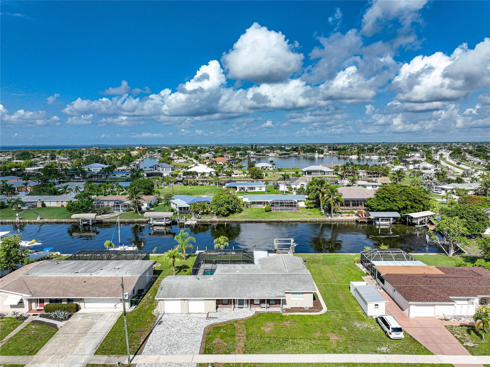 Welcome to 118 Severin, where upscale living meets Florida’s laid-back charm. This fully furnished, beautifully updated rental is nestled on a canal-front lot with a private dock—just minutes from open water and only about 3 miles (a 7-minute boat ride) to the Peace River, perfect for boating enthusiasts or anyone seeking a serene waterfront lifestyle.
Inside, this home exudes elegance with polished terrazzo flooring, designer coastal décor, and a bright, open layout that invites natural light through oversized sliding glass doors. The gourmet kitchen boasts quartz countertops, slate-gray cabinetry, stainless steel appliances, and a spacious center island that’s perfect for hosting or enjoying morning coffee.
The heart of this home opens seamlessly to a showstopping outdoor space. Enjoy a screened-in lanai and sparkling pool with a full panoramic cage enclosure, offering breathtaking canal views and ultimate privacy. A covered patio area is ideal for al fresco dining or lounging in the shade.
Comfortable bedrooms, including a stylish primary suite, provide ample indoor and outdoor entertaining space. Whether you’re working remotely, entertaining guests, or launching your boat right from your backyard, this home offers the perfect balance of luxury, functionality, and location.
Just minutes from Gulf beaches, fine dining, golf courses, and all the best of Southwest Florida.
Available now for high-end rental—fully furnished, move-in ready, and absolutely unforgettable.