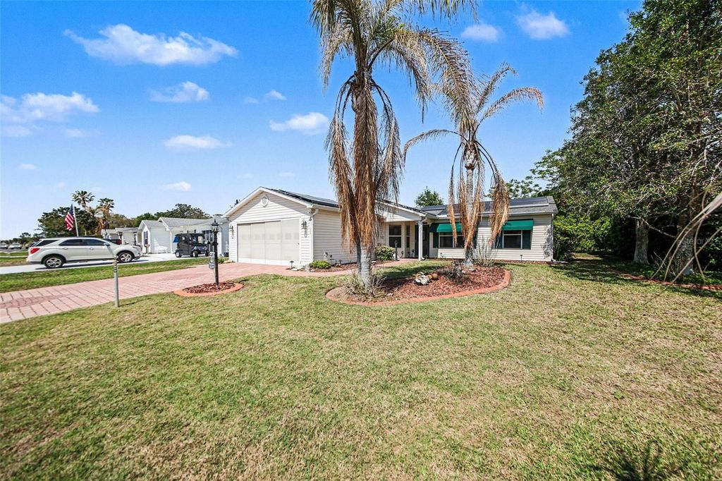 Photo of 1239 Chaparral Drive, Lady Lake, FL 32159 (MLS # O6394215)