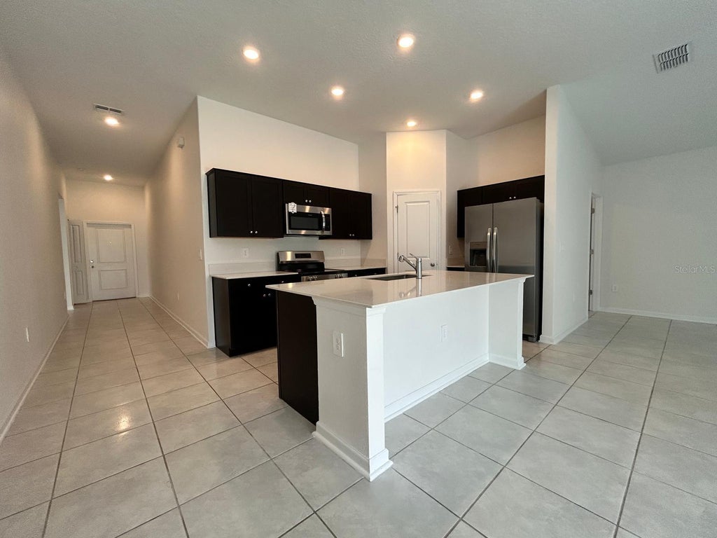 Photo of 318 Lawson Avenue, Haines City, FL 33844 (MLS # S5157989)