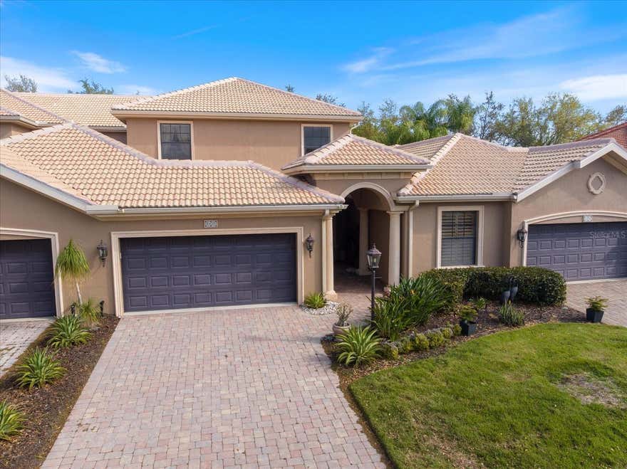 Move-in-Ready, welcome to Bougainvillea Place by Gilbraltar Homes - maintenance-free with resort-style amenities & no CDD.  Beautifully designed 4bed, 3.5bath & 2 oversized car garage with screen townhome offers the perfect blend of comfort, convenience and community amenities with minimal maintenance for today’s lifestyle. 

LOCATION, LOCATION…Located in a gated community, just minutes from Ellenton Premium Outlets, dining, shopping, and with quick I-75 access. 

Step inside and immediately notice the vaulted ceilings and diagonal tile flooring that set the tone for the open living and dining areas with custom lighting. The kitchen features maple cabinets, stainless steel appliances, a pantry, new quartz countertop (2024) making it as practical and inviting.  Just off the kitchen, a cozy family room with electric fireplace provides the perfect space to relax.

Main floor primary suite - 2 walk-in closets, split vanities, walk-in tile shower and a garden tub; half guest bath; laundry room with storage, sink and second fridge and screened/covered backyard patio.

Second floor en-suite and 2 other bedrooms with double vanities Jack & Jill bath and a decent size loft space. 

Family room and kitchen are combined.  Center vacuum rough-in ready installed in the garage.

Take advantage of the community’s resort-style amenities—a sparkling pool, clubhouse, fitness center, and even a small dog park for your furry friends.

FURNITURE NEGOTIABLE