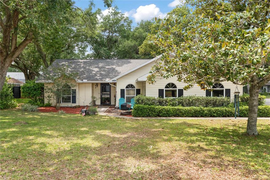 Welcome to 2121 Wildwood Ln — a beautifully maintained home tucked away in one of Auburndale’s most desirable established neighborhoods with NO HOA. Ideally positioned between three major lakes, this property offers the perfect blend of peaceful residential living with convenient access to shopping, dining, and everyday essentials. The nearby city community center provides activities and recreation for all ages, while Publix and surrounding retail centers are just minutes away.

Surrounded by majestic oak trees, this home welcomes you with timeless curb appeal and a private setting. Inside, you’ll find a spacious and functional layout featuring a formal dining room, walk-in pantry, granite countertops in the kitchen and bathrooms, and a warm gas fireplace that anchors the main living space. The screened lanai creates the perfect place to relax and enjoy Florida living year-round.

The primary suite offers added comfort with an upgraded turbine ventilation feature, while a pocket-door to bathroom.  Also includes a walk-in shower for convenience and style. Most flooring is hard surface, with carpet in only two bedrooms.

Major recent improvements completed in 2025 include a new roof, water heater, water softener, and elevated privacy fence—providing peace of mind for years to come. Additional highlights include public water, fiber internet availability, in-ground irrigation, termite protection, 230-volt generator hookup, and a climate-controlled garage with a new AC unit—ideal for hobbies, projects, or workshop space.

If you’ve been searching for space, character, upgrades, and freedom from HOA restrictions, this move-in ready property delivers comfort, charm, and modern convenience in an exceptional location.