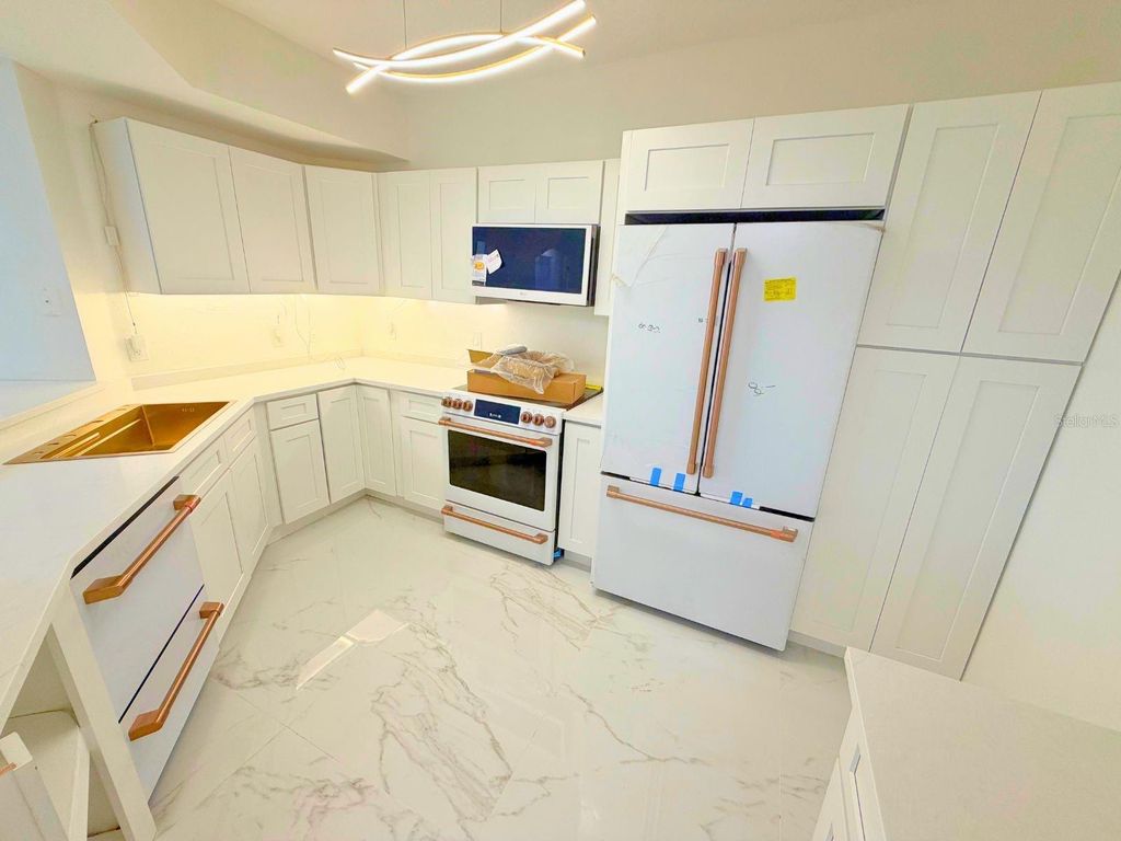 Photo of 5560 Metrowest Blvd #308, Orlando, FL 32811 (MLS # O6370103)