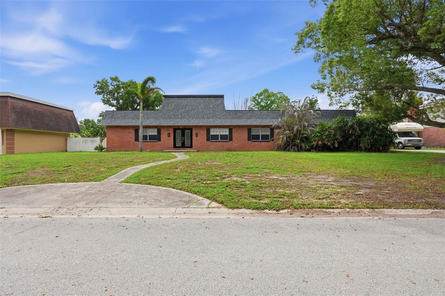 Welcome to this 4-bedroom, 3-bathroom pool home in Brandon offering 2,360 square feet of thoughtfully designed living space, a desirable three-car garage, and a fantastic location close to parks, shopping, dining, and convenient access to I-75 for easy travel to neighboring cities. Inside, you’ll immediately notice the elegant details throughout including crown molding, wainscoting, and spacious living areas designed for both everyday comfort and entertaining. The home features a formal dining room and separate family room, while the open living room and kitchen combo create the perfect central gathering space. The inviting living room showcases a cozy fireplace, built-in shelving, and beautiful backyard views that bring in plenty of natural light. The kitchen offers stainless steel appliances including an oven and dishwasher, ample cabinetry, and a breakfast nook overlooking the backyard and pool area, making it the perfect spot for casual dining or morning coffee. A dedicated laundry room downstairs adds convenience to daily living. The spacious primary suite is located downstairs and serves as a relaxing retreat with a large walk-in closet and private en suite bathroom. An additional downstairs bedroom and full bathroom provide flexibility for guests, a home office, or multigenerational living. Upstairs, you’ll find two additional bedrooms that share a well-appointed full bathroom. Step outside to your private backyard oasis featuring a covered patio ideal for grilling, entertaining, or simply enjoying the Florida weather year-round. The gorgeous palm tree beside the pool creates a perfect private tropical retreat, while the fully fenced, spacious backyard and private pool provide plenty of room for outdoor fun, pets, or gatherings with family and friends. This Brandon home combines comfort, charm, and convenience in a location that puts everything within easy reach. Schedule your showing today!