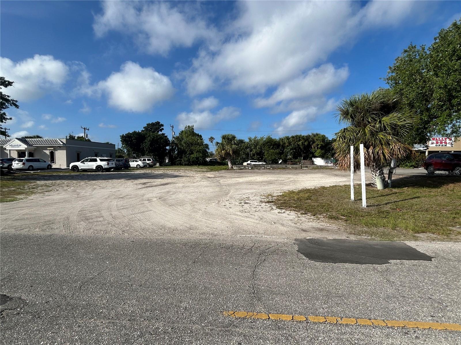 **Prime Commercial Property at 3601 Tamiami Trail, Port Charlotte, FL 33952**
Discover an outstanding opportunity to acquire a vacant commercial property in the heart of Port Charlotte. This parcel encompasses approximately 16,050 square feet (0.37 acres) of land, zoned for commercial use, making it ideal for various development projects. Strategically situated along the bustling Tamiami Trail (US 41), the property offers excellent visibility and accessibility. Its central location places it near key amenities, including shopping centers, dining establishments, and medical facilities, catering to a diverse clientele. Additionally, the site is well-connected to major thoroughfares, ensuring convenient access to surrounding areas.
**Key Features:**
Size:** Approximately 16,050 square feet (0.37 acres)
Zoning:** Commercial
Location:** Prominent frontage on Tamiami Trail (US 41)
Accessibility:** Close proximity to shopping centers, dining, medical facilities, and major roads
This property presents a rare chance to invest in a prime commercial location within Port Charlotte's thriving business district. Don't miss out on this exceptional development opportunity.