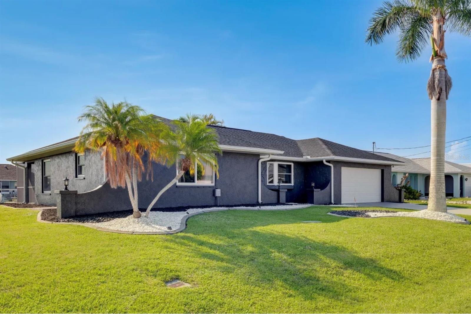 *LAWN MAINTENANCE INCLUDED***$3,500/MO WITH ONE YEAR LEASE***$4,500 MONTH-TO-MONTH UTILITIES INCLUDED***MOVE IN READY, GULF ACCESS, WATERFRONT HOME WITH A GREAT DEAL OF OUTDOOR SPACE. Welcome to this stunning two-bedroom, two-bathroom home with a two-car garage, offering both luxury and comfort. Situated with a serene water view and direct access to the Myakka River, which flows into the Gulf of Mexico, this property provides the perfect setting for relaxation and outdoor activities. A BOATERS PARADISE! After purchasing, the home underwent extensive renovations, including the installation of hurricane windows (2023), brand new A/C (2022), water heater (2023), whole-home water filter and softener system that provides clean and soft water (2023), exterior paint (2023), screen enclosure (2023), $55k sea wall (2022), and a new roof designed to withstand winds up to 160 mph to ensure peace of mind during storm season. Even a new stove, dishwasher, and washer/dryer, ensuring modern amenities throughout! Unwind in your own private oasis with a 6-seat jacuzzi, perfect for relaxing after a long day. Enjoy a beautiful, spacious backyard ideal for gatherings, gardening, or simply unwinding. The property also includes a dock to access the river and park your boat. The home is fully furnished, but the furniture can be removed if you wish. It offers an unbeatable combination of comfort, convenience, and scenic beauty truly a must-see! 5202 Forbes is located just 5 minutes from Tampa Bay Rays Training Stadium, less than 3 miles from shopping mall & any Parks, 20 minutes from multiple Gulf Beaches, Punta Gorda regional Airport is located 15 miles away. Fisherman's Village and Historic District are about 10 miles away with multiple restaurants and quaint boutique stores. GREAT LOCATION AND HOME! This beautiful property is a MUST SEA! Information is deemed reliable but not guaranteed.