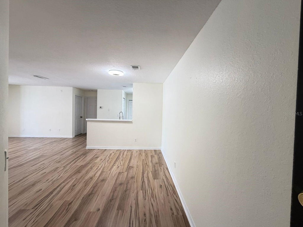 Photo of 7618 Pissarro Drive #15201, Orlando, FL 32819 (MLS # O6429468)
