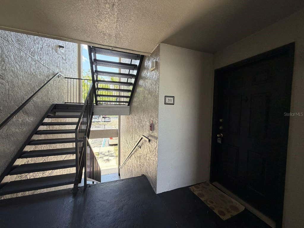 Photo of 7618 Pissarro Drive #15201, Orlando, FL 32819 (MLS # O6429468)