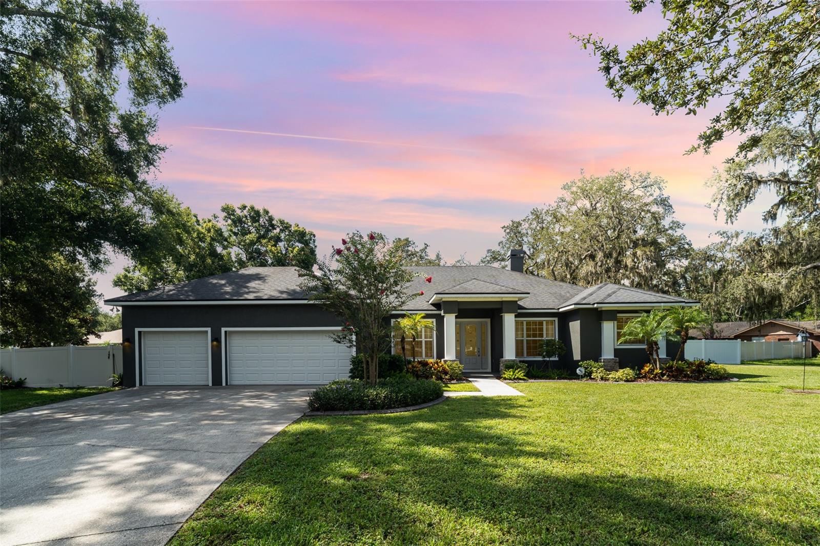 Beautiful 3 bedroom plus office, custom built home situated on 1 acre. Open Great Room features wood burning fireplace and 8' tall sliding glass doors opening to the pool area. The built in cabinets can house speakers and audio equipment. Crown molding flows in to the formal dining area and kitchen. The kitchen has 36" upper cabinets, stainless appliances and gleaming black granite countertops. The owners retreat has a walk in closet and private bath featuring double vanities, walk in shower and separate tub. Secondary bedrooms have nice size closets. The office has a double door entry. Enjoy great Florida living relaxing on the 52' x 25' screened lanai. Beautiful pavers surround the salt water pool. The lanai also has pre-wire for a hot tub and external speakers. Asphalt paving off the driveway leads to a detached 30' x 41' RV/Boat carport which also includes a 10 x 12 shed with 6' wide roll up door. Back and side yards are completely fenced with white vinyl fencing. Property is located 8/10 of a mile from the Riverview Civic Center and Boat Ramp. NO HOA NO CDD. Location offers easy access to major highways and shopping. Great place to call home!