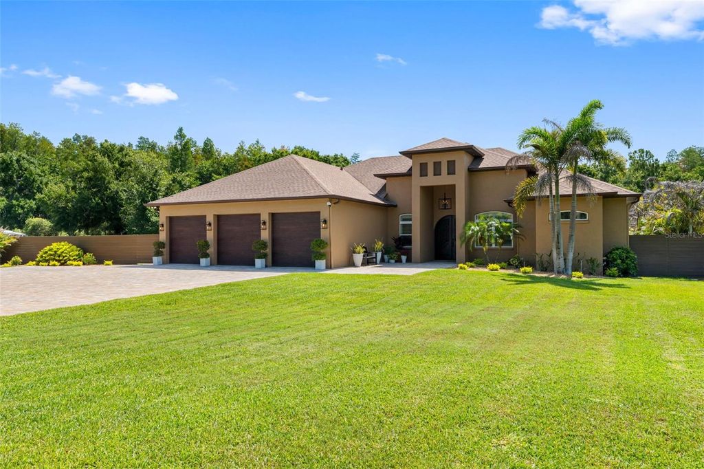 Photo of 17117 Lakeshore Road, Lutz, FL 33558 (MLS # TB8517828)