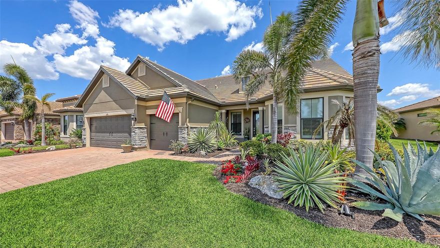 Tastefully appointed throughout, this popular 2 story Pinnacle floor plan boasts of 3 bedrooms (1 is on-suite), 3 baths plus a den on the first floor & 1 bedroom (20x20) plus bath &  35x21 bonus room on the second floor.  The 3700 sq. ft. home is hurricane prepared with impact windows & doors for the entire home providing lower insurance costs. Over $200,000 in custom upgrades such as: crown moldings, real hardwood floors on first floors,  gourmet kitchen with custom backsplash & top of the line stainless Kitchen Aide Appliances. Extended 40x28 paver brick screened lanai with captivating lake views. Generous master suite on first floor with huge walk-in closet. A true 3 car garage with 4 ft. depth extension.  Sandhill Preserve is one of Palmer Ranch's newer communities with only 308 homes. The community features a community pool, jacuzzi, fitness center, pickle ball, club house, fire pit, barefoot bar area tennis & more. Located in the heart of Palmer Ranch just minutes from world famous Siesta Key beach, shopping, restaurants & Legacy bike trail.