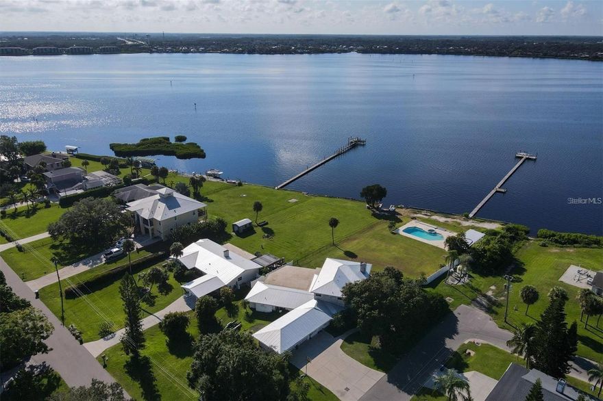 Rare Opportunity OWNER FINANCING to Own a Subdivide-able RSF 4.5 Residential Property on Nearly an Acre on the Manatee River with Amazing Sunset Water Views! This Fabulous 3 Bedroom, 4 Bath Home w/Den and Family Room Sustained some Flood Damage from Milton. Seller Occupies this Home. This 3900+ SF Home Features: Upstairs Master Suite w/Fireplace and Master Bath w/Balcony Looking out to Water Front Views; Large Living Room w/Fireplace, Open Dining Room, Large Family Room and Open Kitchen all have Gorgeous Water Front Views Looking Out to a Large Private Pool w/Spa, Cabana, 350 Foot Private Boat Dock w/Newer Seawall and Fabulous Dreamy Water Views Across the Manatee River, 2 Bedrooms are on Main Floor - One w/En-Suite Bath, Possible 4th Bedroom or MIL Lay-out w/Outside Entrance perfect for an AirBnb Rental, Work-out Room, Den Laundry Room, Upstairs Screened Balcony, Lower Level Screened Porch, Block Construction, Vinyl Siding, Recently Updated AC and Tin Metal Roof, 3 Car Garage, RV and Boat Parking, Non-Deed Restricted. Bring Your Imagination and Remodel this Home, Tear Down and Build One Fabulous Brand New Home or Tear Down and Subdivide this Lot and Build 2 or 3 Possibly Beautiful New Homes w/RSF 4.5 Zoning!