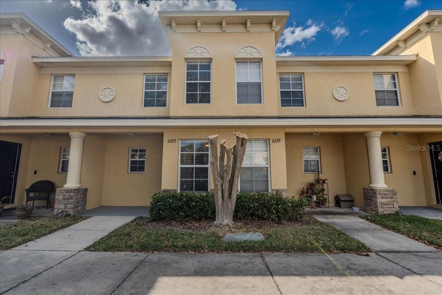 Welcome to this clean, well-maintained townhouse offering flexible living with 2 bedrooms and 2½ bathrooms in a desirable gated community. The spacious 1,561 sq ft layout features a bright, airy living room with sliding doors that open to your private screened lanai and peaceful grassy area beyond — perfect for relaxing or entertaining. The functional U-shaped kitchen is equipped with beautiful wood cabinetry, ample counter space, and a full suite of appliances, plus a convenient pass-through to the dining area that makes hosting effortless, whether it’s a dinner party or a quiet night at home. Downstairs also features a convenient half bath with an in-unit laundry area. Upstairs, both bedrooms are thoughtfully positioned for privacy, including a generously sized primary suite. A versatile loft/den upstairs provides flexible space for a home office, playroom, media area, guest space, or potential third sleeping area. Enjoy Florida living at its best with access to a resort-style community pool, all within a friendly, quiet neighborhood close to shopping, dining, and medical facilities. This private oasis offers comfort, convenience, and value — ready for you to move right in. Don’t miss your chance to call it home.